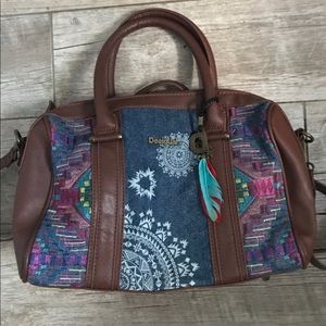 Desingual hand bag